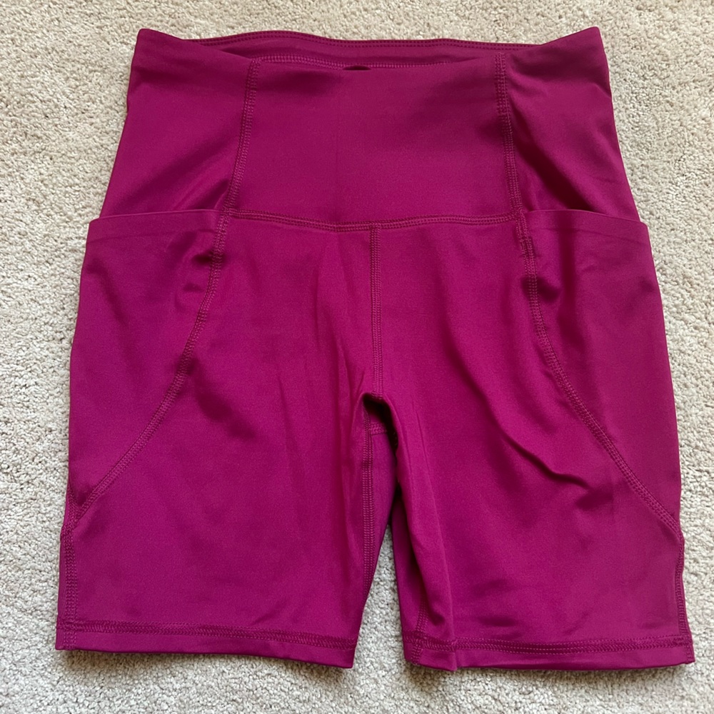 Pink biker shorts with pockets
